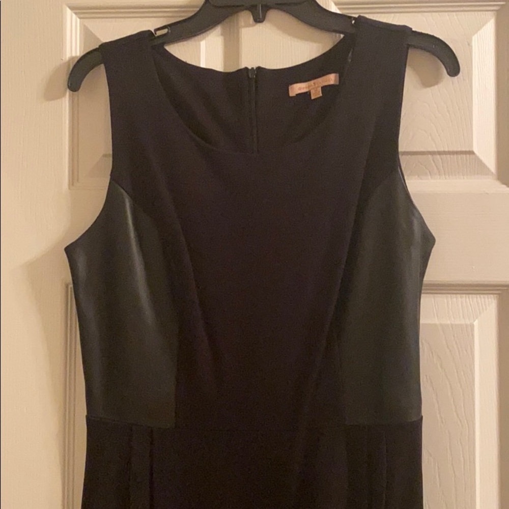 A line dress with black leather panels